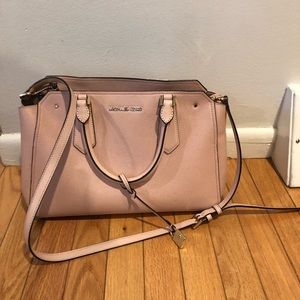 Medium sized light pink Michael Kors bag